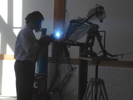 Brian Alabaster working on Stanley Hollis sculpture1.jpg