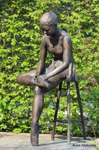 bronze of seated ballet dancer