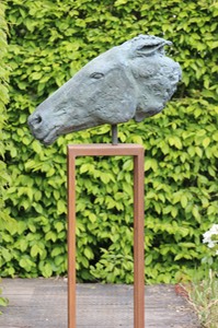 Horse head on plinth